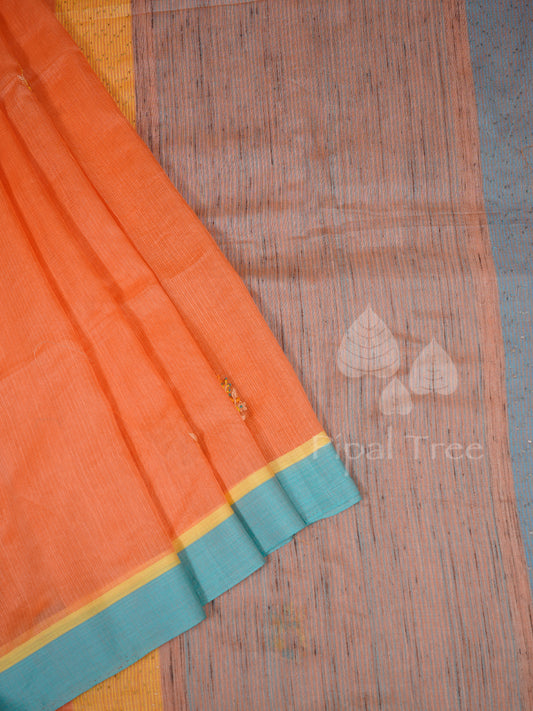 peach kota with a blue pallu